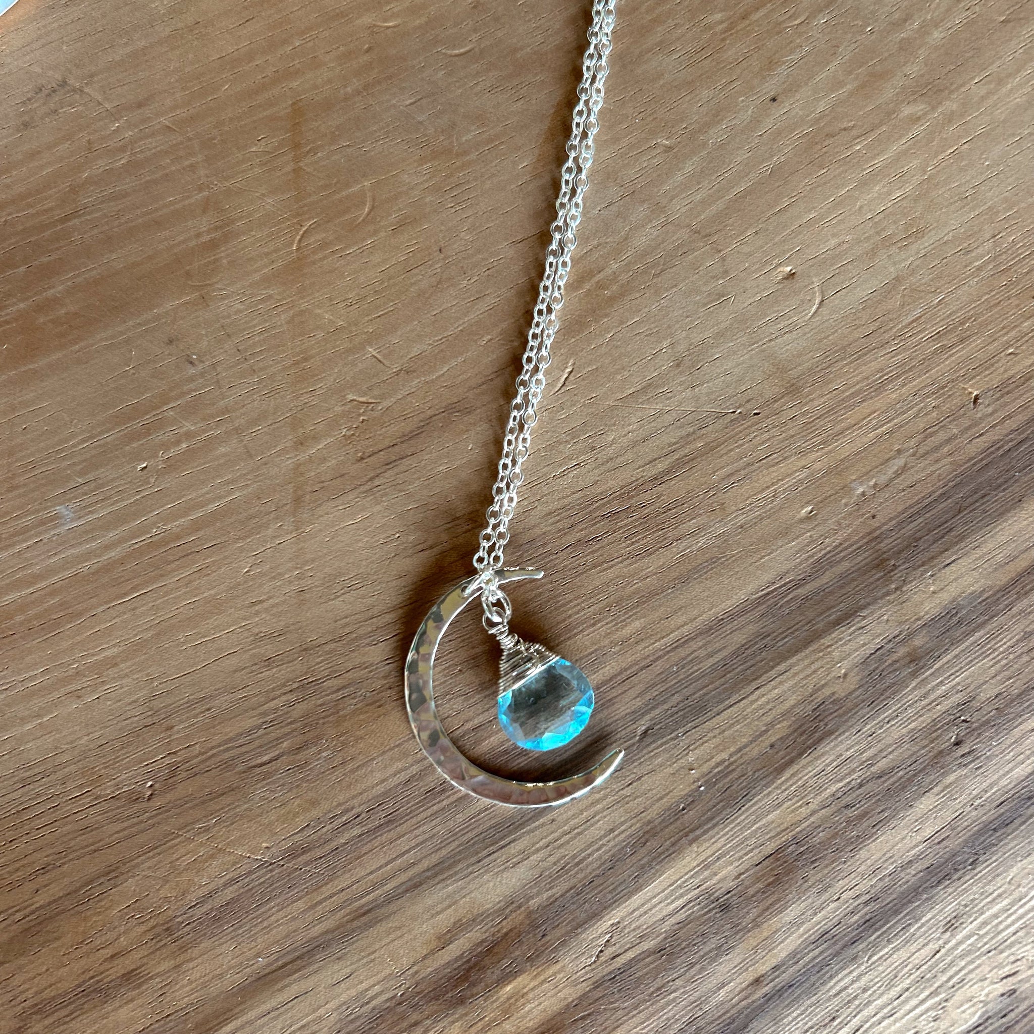 1828- Sky Blue Topaz Silver Crescent